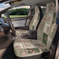 the interior of a car with floral seat covers