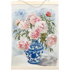 a painting of pink flowers in a blue and white vase on a wall hanging decoration