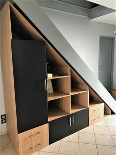 an open book shelf under a slanted roof