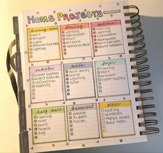 a planner with the words home projects written on it and an open spiral bound notebook