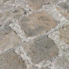 an image of stone flooring that looks like it is made out of cement blocks