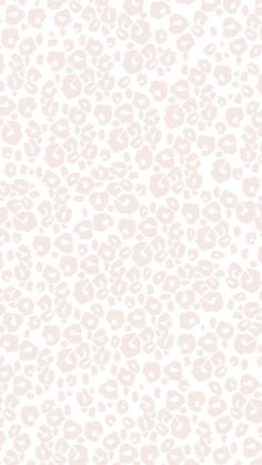 a white and pink leopard print wallpaper with an animal pattern on the back ground