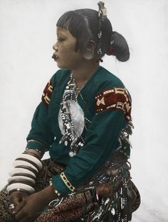 Philippines | A Mandaya woman holds tobacco between her lips to blacken her teeth. Gulf of Davao, Mindanao. 1910s. | ©Dean C Worcester Filipino Hair, Hairstyle Photo, Filipino Clothing, Filipino Fashion, We Are The World, Asian Hair, Hair Care Tips