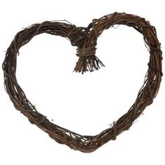 a heart shaped wreath made out of twigs