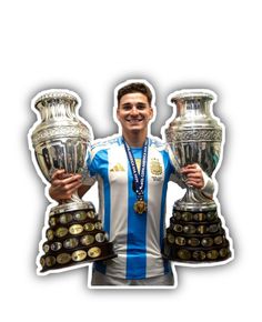 a man holding two trophies in his hands