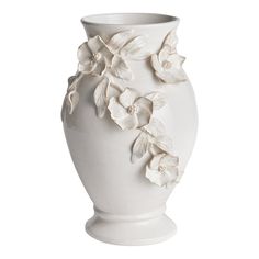 a white vase with flowers on it is sitting in front of a white background,