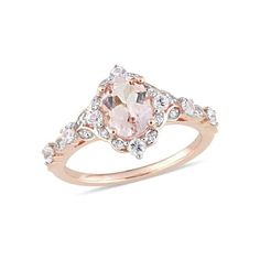 a ring with an oval shaped morganite surrounded by small white and pink diamond accents