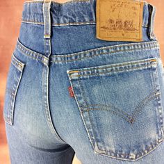 Size 32 Vintage 90's Levis 515 Women's Jeans High Waisted W32 L30 Distressed Faded Jeans Mom Jeans Boyfriends Jeans Dad Jeans Made In USA Brand: LEVIS 515 Size On Tag marked W33 L34 but fits more like 32" waist, 12.5" rise, 24.5" thighs, 42.5" hips, 30" inseam, 16" leg opening! Fits a size 32, but check your measurements and compare the measurement with your garment. (see full measurement below) Recommended waist size: 32" (32x30) *size 32 for a waist of 32 inches, expect your jeans to measure a High Waist Faded Bottoms With Belt Loops, Faded High-waist Bottoms With Belt Loops, High Rise Faded Bottoms With Belt Loops, Faded High Rise Bottoms With Belt Loops, Classic Fitted Distressed Jeans, Fitted Faded Pants With Pockets, Fitted High Waist Faded Bottoms, Classic Distressed Faded Bottoms, Fitted Washed Bottoms With Standard Cut Leg