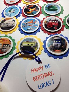 a birthday card with cars and trucks on it