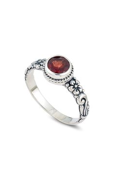 A floral design made of garnet adds a feminine style to this sterling silver ring. 5/16" L X 5/16" W Sterling silver, garnet Wipe with polishing cloth 1 year unlimited brand warranty Imported Orders cannot be shipped to Canada, Puerto Rico, APO, FPO or P.O. Boxes. Garnet Birthstone Rings, Round Solitaire Ring, Round Solitaire Rings, Garnet Ring Silver, Garnet Birthstone, Round Solitaire, Garnet Rings, Birthstone Ring, Womens Jewelry Rings