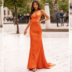 Beautiful Unique Orange Gown! This Is A Made To Order Item. I Planned On Wearing It To A Black Tie Wedding But Went With A Tuxedo Look Instead. Tags Removed But Outside Of Trying It On, It Has Never Been Worn. Sizing Is Tricky- It Is An Xs But My Measurements Are 38 Bust, 27 Waist, 36 Hip With 36d Bra And This Fits Me, The Bust Strap Is A Bit Tight But As You Can See From The Photos Everything Else Looks Perfect. I’m Normally A Small. The Material Is A Thick Stretchy Satin, Very Flattering. I’m 5’8” And As You Can See It Has A Train- I’m Wearing A 2 Inch Heel For The Pics. From An Australian Brand- If You Need A Gown And Don’t Want To Get The Same One Everyone Is Getting From Orange Gown, Alamour The Label, Orange Satin, Black Tie Wedding, Dreamy Dress, Satin Gown, Mermaid Gown, Red Aesthetic, Evening Dresses Long