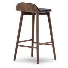 the backless bar stool with black leather seat and wooden frame, on an isolated white background