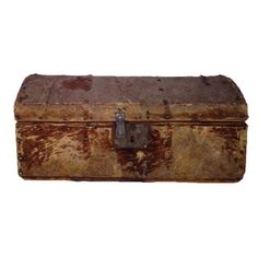 an old trunk with rusted paint and metal latch on the top, sitting against a white background