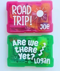 there are two plastic containers that say road trip joe and are we there yet?