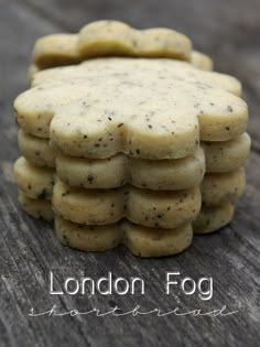 a stack of shortbreads sitting on top of a wooden table next to the words london fog