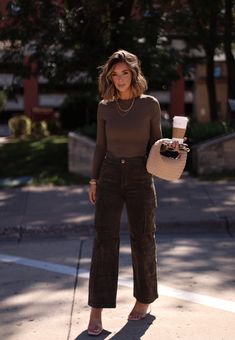 Comfy yet stylish, our Dark Olive Corduroy Cargo Pant has a high-waisted design with button and zipper closure, cargo pockets, and straight legs for an edgy look. Made of soft, stretchy corduroy, it's perfect for elevating your fall wardrobe. Ideal for a casual autumn weekend. Fabric 97% Cotton 3% Spandex Hand wash cold. Powerful Style Women, Streetwear Fashion Office, Business Casual Closet Capsule Wardrobe, Classy Fashion Casual, Corduroy Work Outfit, Womens Fall Style 2024, Corduroy Fall Outfit, Anthropologie Mom Style, Minimal Fall Style