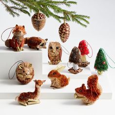 an assortment of small christmas ornaments on display