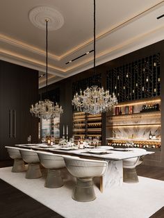 an elegant dining room with chandeliers and wine bottles on the wall behind it