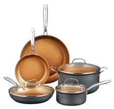 an assortment of pots and pans with lids