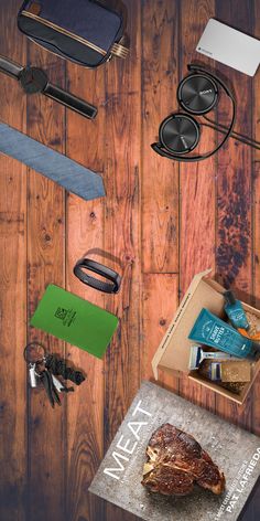 an assortment of items laid out on top of a wooden floor next to each other