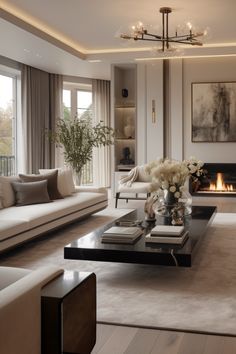 a living room filled with furniture and a fire place in the middle of a room