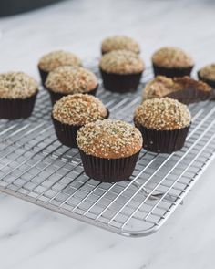 several muffins cooling on a wire rack