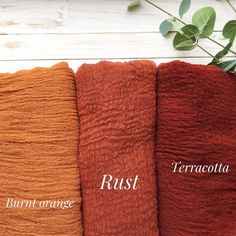 three towels with the names rust, terracotta and burnt orange