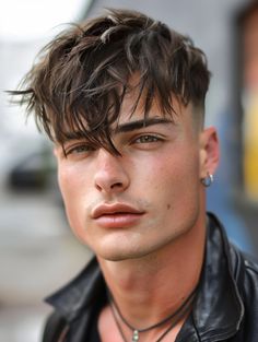 Layered bangs with a subtle fade offer a soft, approachable look, suitable for men with long hair or those sporting medium hairstyles. This style is particularly flattering for those with longer, oval faces as it adds texture and depth, softening the overall facial features. It’s ideal for everyday wear, providing a friendly and inviting appearance. Cut Hair Men, Haircut For Men Fade, Young Mens Hairstyles, Male Haircuts, Fade Undercut, Layered Bangs, Male Hairstyles, Man Bun Hairstyles, Haircut For Men