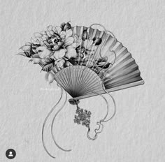 a drawing of a fan with flowers on it