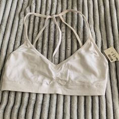 Sports Bra Nwt Has Small Stain On The Top Strap In The Back Didn’t Wash Since Nwt Stain From Storage In Bin On The Top, Sports Bras, Women's Intimates, The Back, The Top, Sports Bra, Color White, Stain, Bra