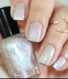 25+ Winter Nail Colours To Cheer You Up This Season - White Shimmer Nail Polish, White Shimmer Nails, Winter Nail Colours, Silver Sparkle Nails, Sparkly Nail Polish, Nails January, Essie Nail Colors, New Years Eve Nails, Opi Nail Colors