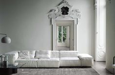 a living room with a large white couch