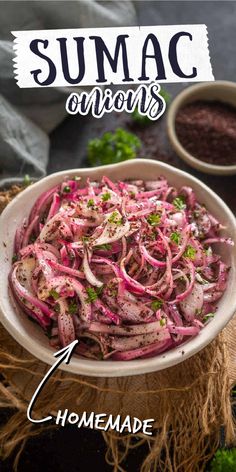 a bowl filled with red onions and garnished with cilantro on the side