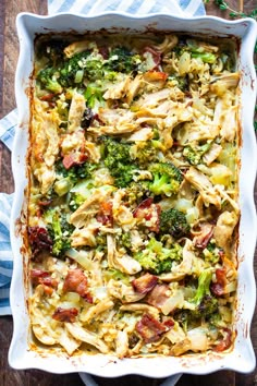 a casserole dish filled with broccoli and chicken