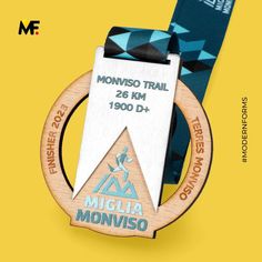 a medal with a ribbon around it that says monviso trail 25 km / 1900 d