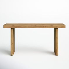 a wooden bench sitting on top of a white floor