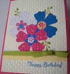 a birthday card with flowers on it