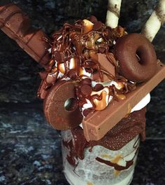 an ice cream sundae with chocolate and marshmallows