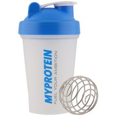 the protein shaker is next to a ball