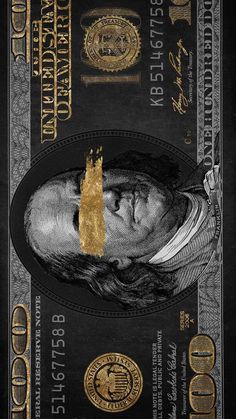 a black and gold dollar bill with the image of abraham lincoln on it's face