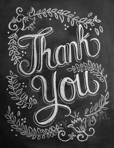 the words thank you written in chalk on a blackboard