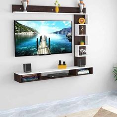 a flat screen tv mounted to the side of a wall