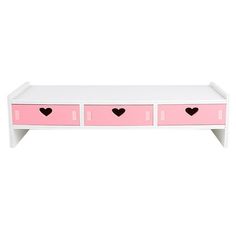 a pink and white bench with hearts painted on the drawers in different shades of pink