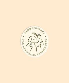 the logo for an aroma therapy company on a peach colored background with brown and white lettering