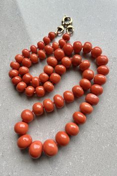 Antique 14k Yellow Gold Large Mediterranean Undyed Red Coral Necklace 112g - 25" Amazing Natural Mediterranean Undyed Red Coral  Necklace Size is 25" Long Tip to Tip Necklace has Amazing Natural 8mm to 15mm Mediterranean Undyed Red Coral Oval Beads Weight is 112.0 Grams on my scale Metal: 14k Yellow Gold Clasp Knotted Necklace - Necklace was Just Re Strung In Great Condition, Any Questions Please Feel Free to ask Thank you Luxury Coral Beaded Necklaces For Formal Occasions, Luxury Coral Beaded Necklace For Formal Occasions, Luxury Traditional Red Coral Beaded Necklace, Luxury Beaded Necklace With Red Coral Gemstones, Cheap Coral Beaded Necklaces With Round Beads, Luxury Coral Necklaces With Gemstone Beads, Luxury Coral Jewelry With Gemstone Beads, Cheap Handmade Coral Jewelry, Luxury Coral Beaded Necklaces With Gemstone Beads