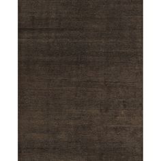 an area rug with dark brown colors