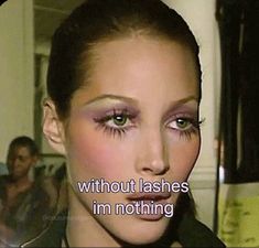 a woman with pink eye makeup has words written on her face that say, without lashes i'm nothing