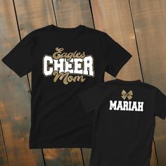 Custom Mascot Glitter Cheer Mom Shirt  *This custom shirt is handmade with professional vinyl. *Our shirts are unisex and are true to size! *In the photo's you will be able to see the custom options in regards to color that you may choose from. *We use 100% cotton shirts. The glitter material does not wash off and will last through multiple washes.  *If your shirt color is out of stock we will contact you as soon as possible to see if you would like to change shirt colors. By purchasing from us you agree to the following statements: *Due to the custom nature of this item we do not accept exchanges or refunds. *We are also not responsible for lost packages. Please contact your local post office for lost package information. Competition Cheer Mom Shirt Ideas, Customizable Black Tops For Cheerleading, Cheer Parent Shirts, Customizable Black Top For Cheerleading, Cheer Parent Shirts Design, Cheer Dad Shirt Ideas, Cheer Mom Shirt Ideas, Crew Neck T-shirt With Glitter Print For Team Spirit, Team Spirit Crew Neck T-shirt With Glitter Print