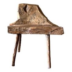 a wooden chair made out of logs on a white background