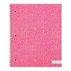 a pink notebook with dots on it